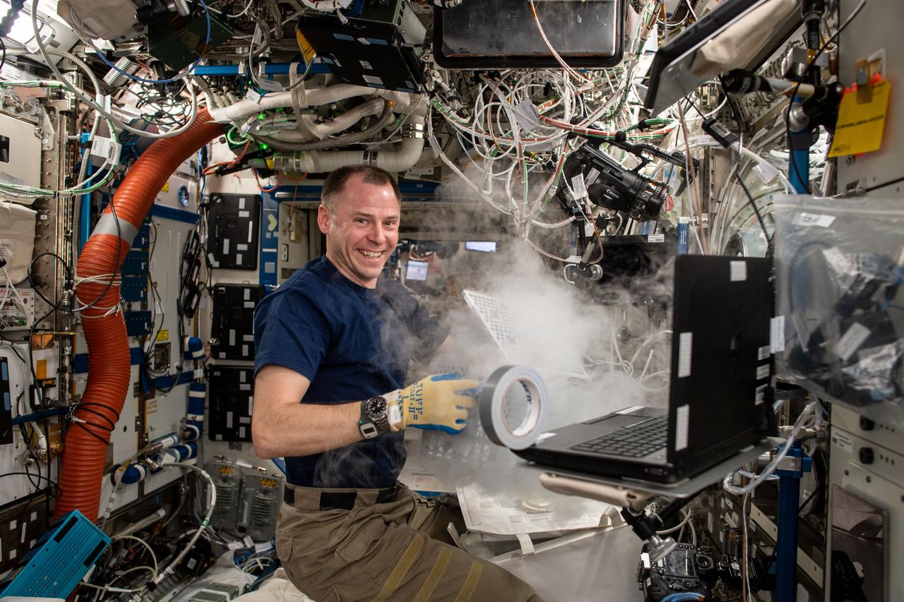iss059e072412 (May 24, 2019) --- NASA astronaut Nick Hague transfers research samples into a specialized science freezer located in the European Space Agency's Columbus laboratory module. The ultra-cold freezers are nicknamed GLACIER, short for The General Laboratory Active Cryogenic International Space Station (ISS) Experiment Refrigerator, and store samples at temperatures as low as -160 °C (-301 °F).