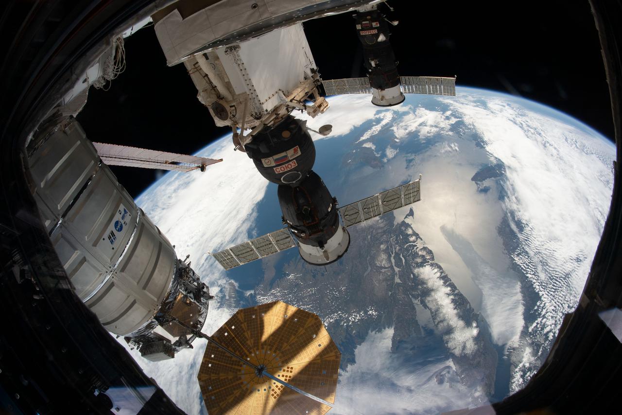 iss059e097992 (June 7, 2019) --- (From bottom to top) The Northrop Grumman Cygnus space freighter, the Soyuz MS-12 crew ship and the Progress 72 cargo craft are pictured attached to the International Space Station as the orbiting complex flew 258 miles above the Gulf of St. Lawrence.