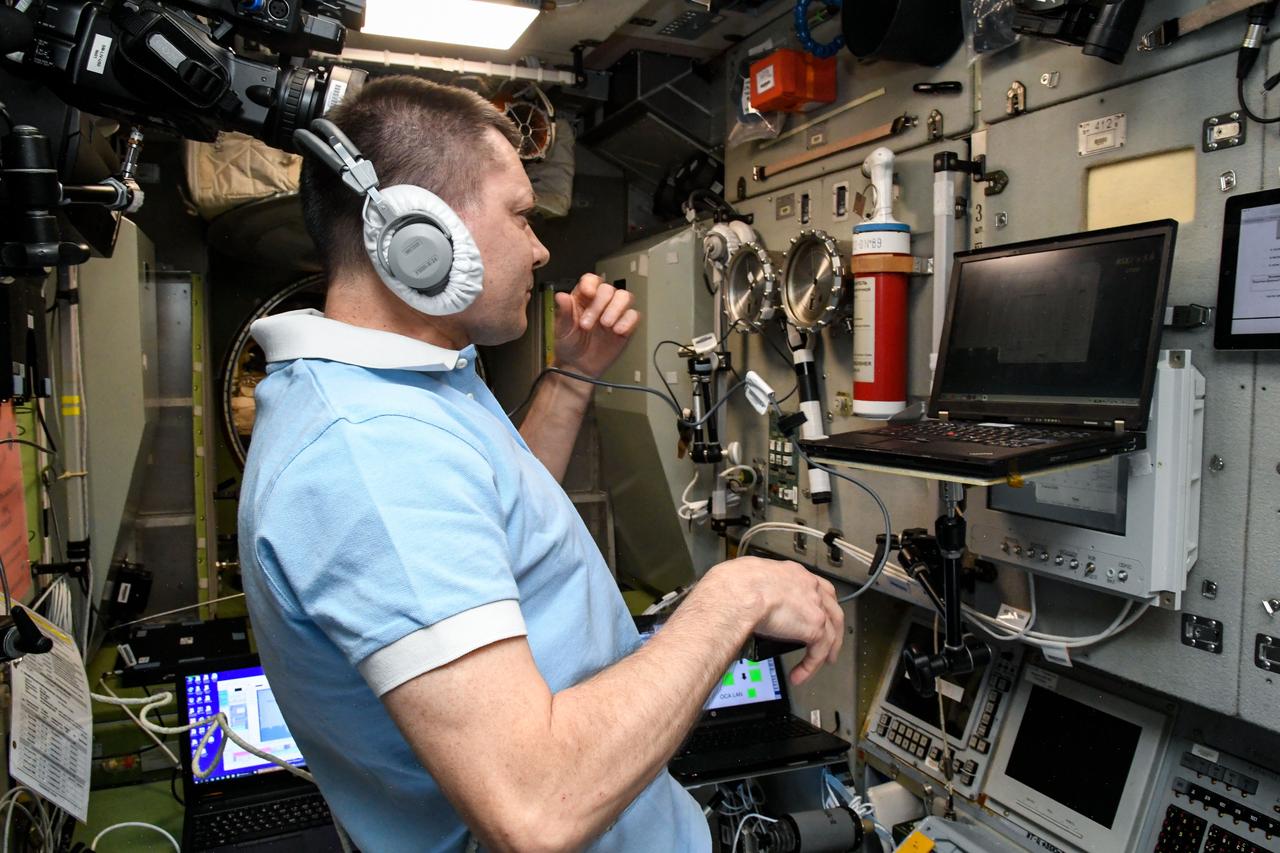 iss059e111655 (June 17, 2019) --- Expedition 59 Commander Oleg Kononenko of Roscosmos practices descent maneuvers on a computer that he will use to return to Earth aboard the Soyuz MS-11 spacecraft on June 24. He will lead Flight Engineers Anne McClain and David Saint-Jacques to a parachute-assisted landing in Kazakhstan after a 204-day mission in space.