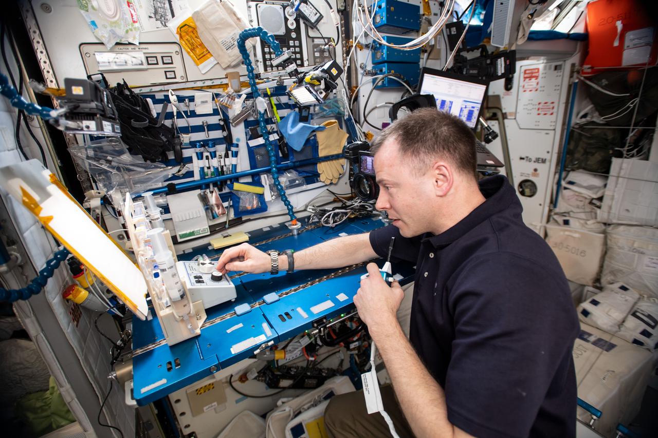 iss059e112425 (June 18, 2019) --- Flight Engineer Nick Hague is supporting research for the Capillary Structures experiment that uses specialized hardware to demonstrate the flow of fluid and gas mixtures using surface tension and fluid dynamics. The fluid physics study is helping NASA evaluate technologies for a lightweight, advanced life support system that can recover water and remove carbon dioxide in space.