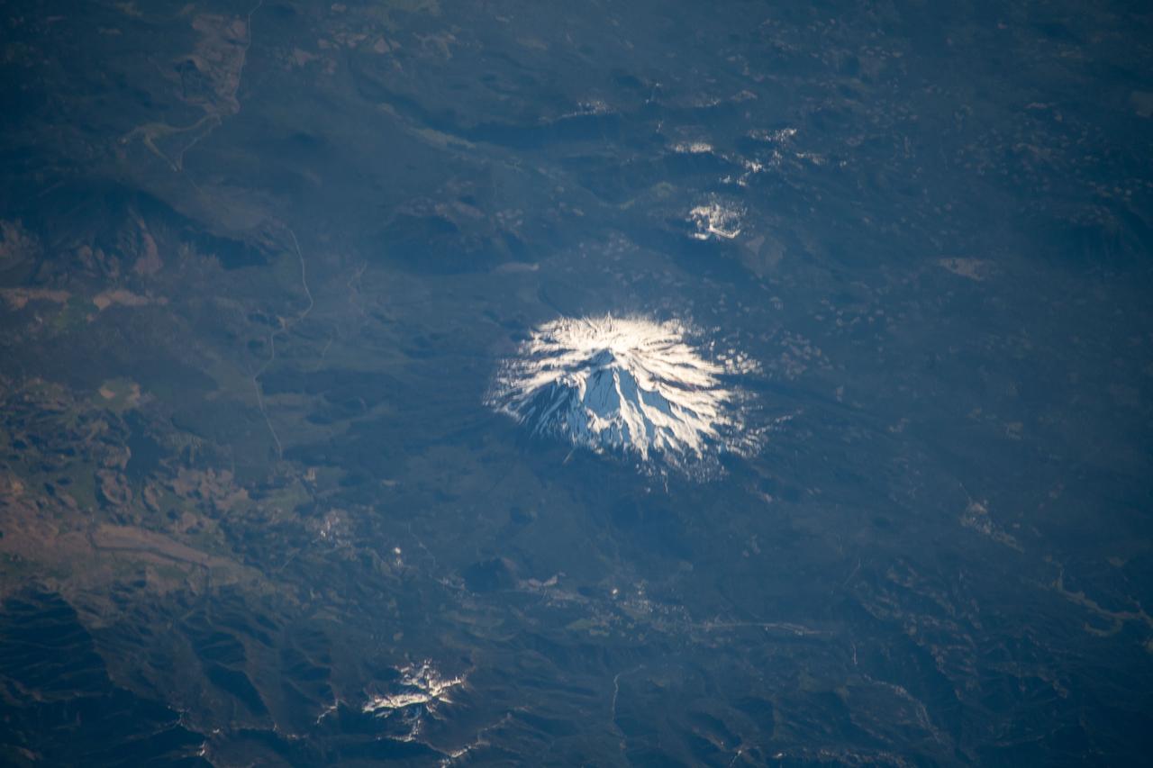 iss059e122328 (June 23, 2019) --- Mount Shasta in California is pictured from the International Space Station as the orbital complex orbited 256 miles above the Pacific Ocean off the west coast of the United States.