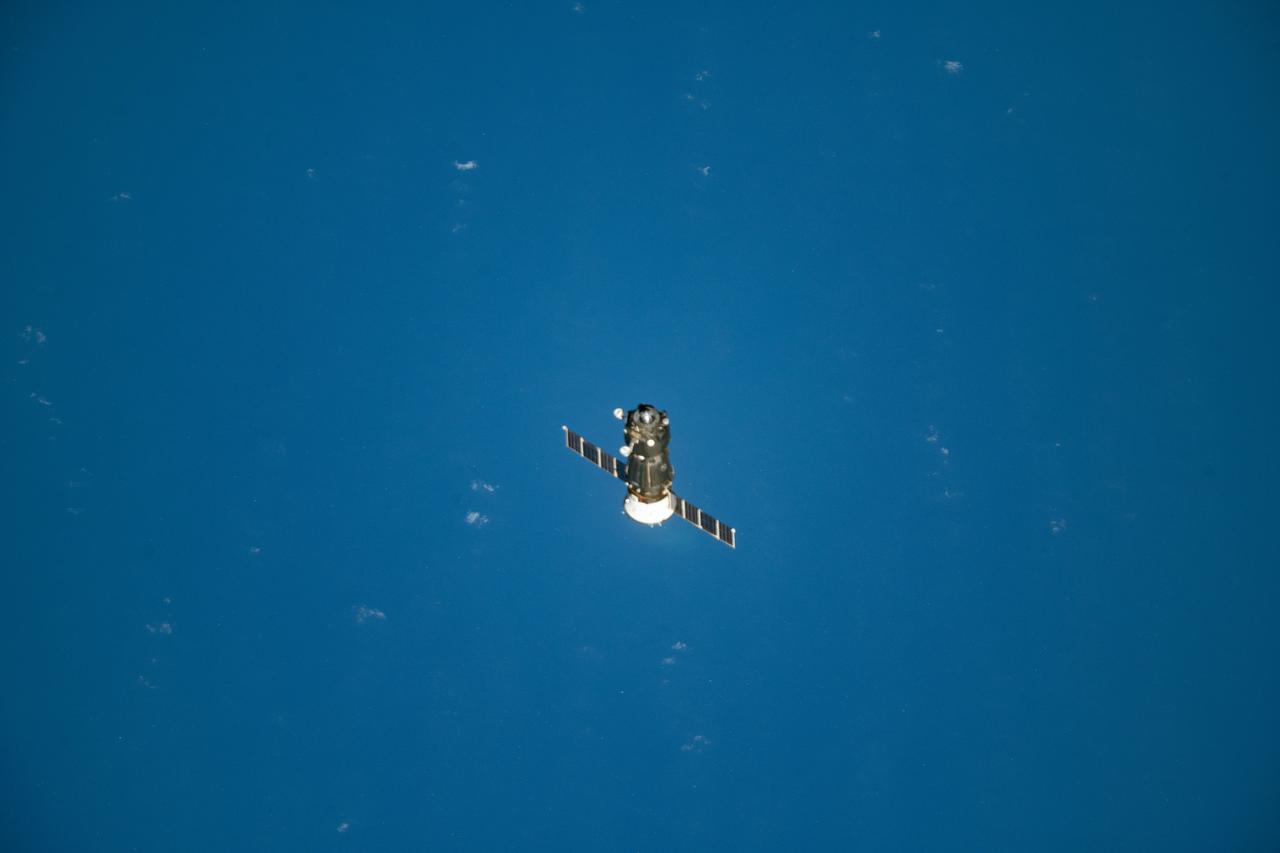 iss059e122556 (June 24, 2019) --- The Soyuz MS-11 crew craft separates from the International Space Station after its undocking and begins its descent to Earth. Expedition 59 crewmembers Oleg Kononenko of Roscosmos, Anne McClain of NASA and David Saint-Jacques of the Canadian Space Agency would parachute to a landing in Kazakhstan aboard the Soyuz after 204 days in space.