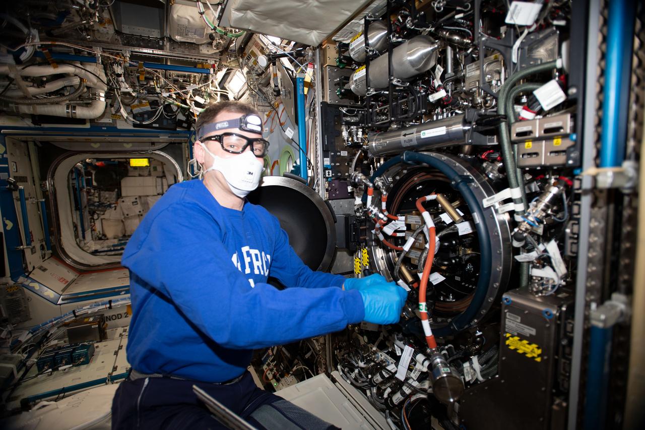 iss060e011502 (July 17, 2019) --- Expedition 60 Flight Engineer Nick Hague of NASA services the Combustion Integrated Rack (CIR) inside the U.S. Destiny laboratory module. The CIR supports safe flame and fuel research potentially benefiting fire safety on Earth and in space as well as the design of advanced combustion systems for spacecraft and Earth-bound vehicles.