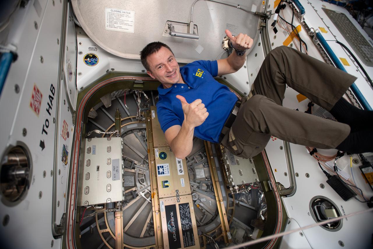 iss060e021464 (Aug. 05, 2019) --- Expedition 60 Flight Engineer Drew Morgan of NASA is pictured in the vestibule between the Unity module and the Northrop Grumman Cygnus space freighter shortly after its hatch was closed. Cygnus departed the International Space Station the next day for several weeks of orbital tests.