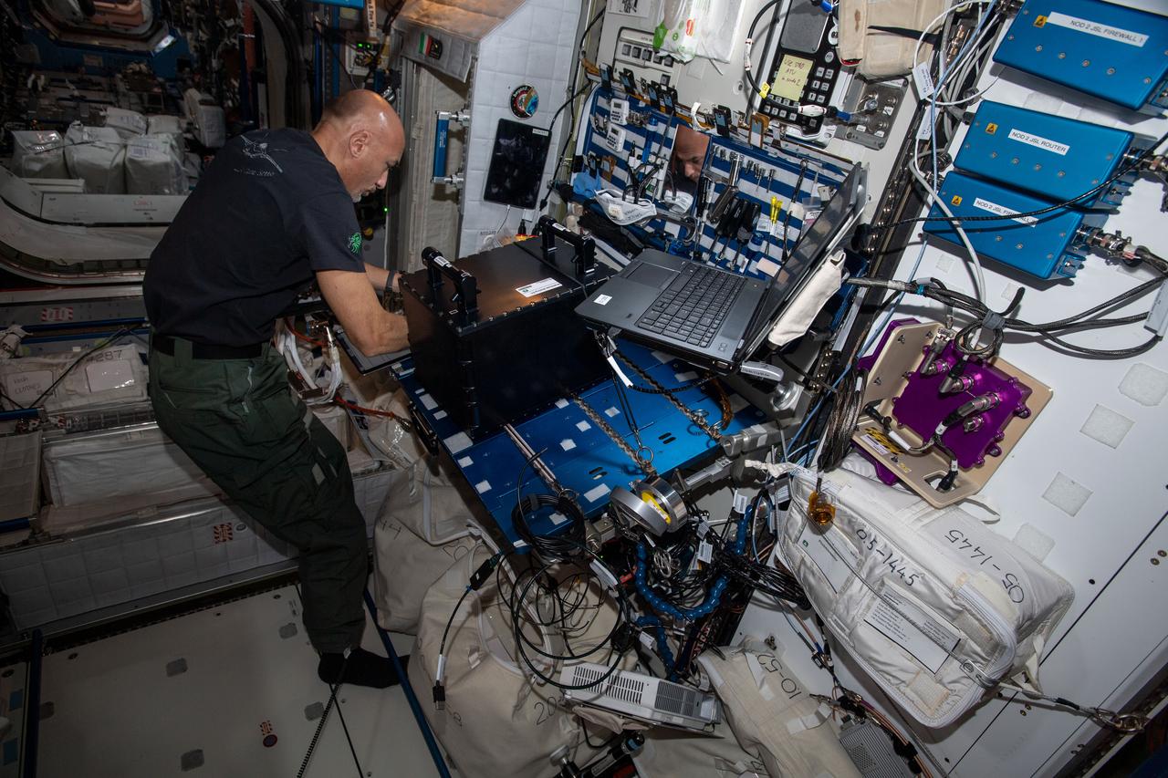 iss060e032989 (Aug. 9, 2019) --- Expedition 60 Flight Engineer Luca Parmitano of the European Space Agency configures and installs hardware in the Fluid Science Laboratory to continue ongoing fluid physics research in microgravity.