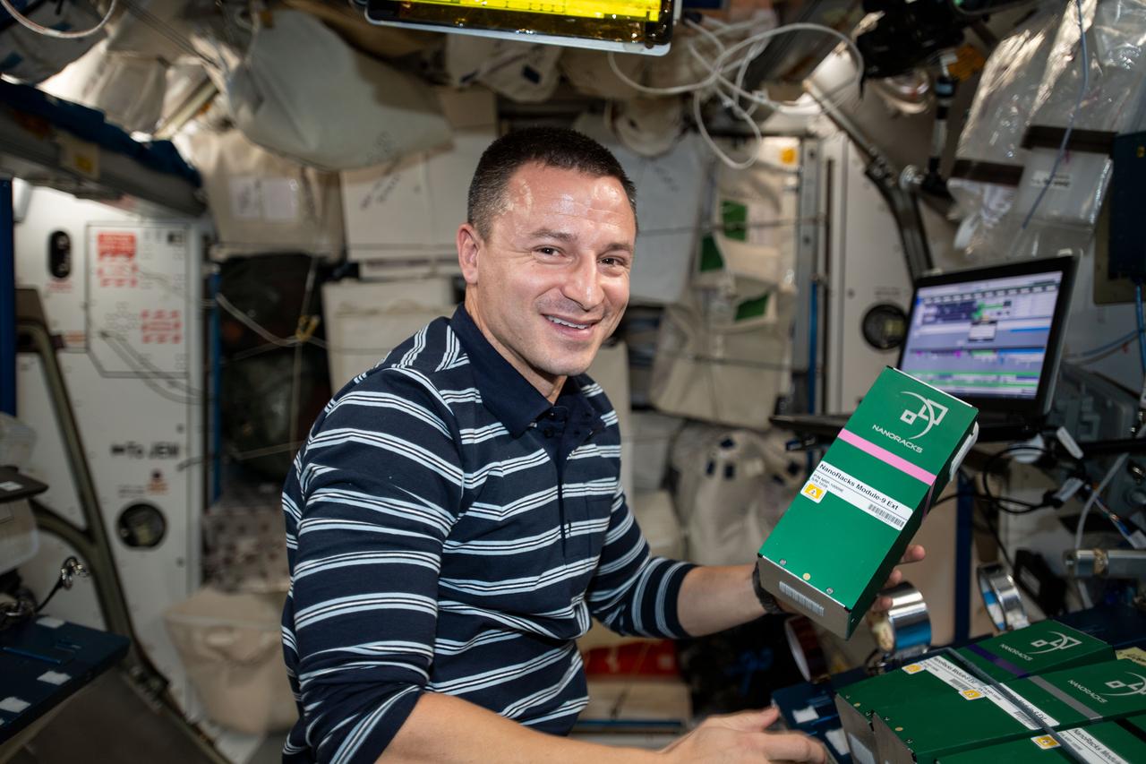 iss060e035409 (8/13/2019) ---  A view of NASA astronaut Drew Morgan during the deactivation and/or shaking designated mixture tubes of NanoRacks-NCESSE-Gemini NanoRacks-National Center for Earth and Space Science-Gemini (SSEP Mission 13) - Part of NanoRacks Module-9 Ext. aboard the International Space Station (ISS). The experiments range from examinations of water filtration and purification to synthetic soil production, rust formation, antibiotic effectiveness, growth and development of microacquatic organisms, and growth of plant, fungi, and bacteria. Each was chosen from more than 3,000 entries submitted by more than 23,000 U.S., Canadian, and Brazilian students. The experiments use NanoRacks MixStix, miniature laboratories activated by space station crew and eventually returned to the student teams on Earth for analysis.
