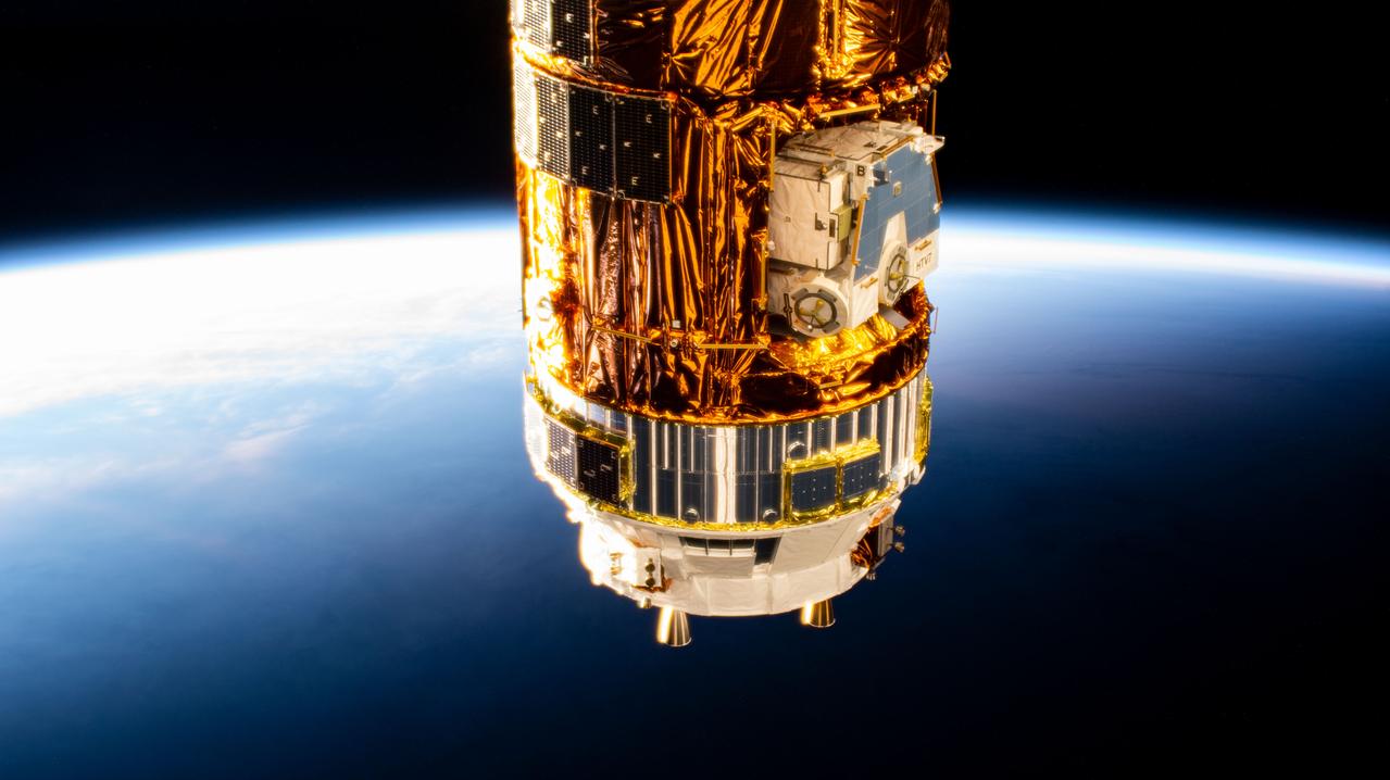 iss061e000052 (Oct. 3, 2019) --- The Kounotori H-II Transfer Vehicle 8 (HTV-8) from the Japan Aerospace Exploration Agency is pictured attached to the International Space Station's Harmony module (out of frame) as the orbiting complex flies into an orbital sunrise.