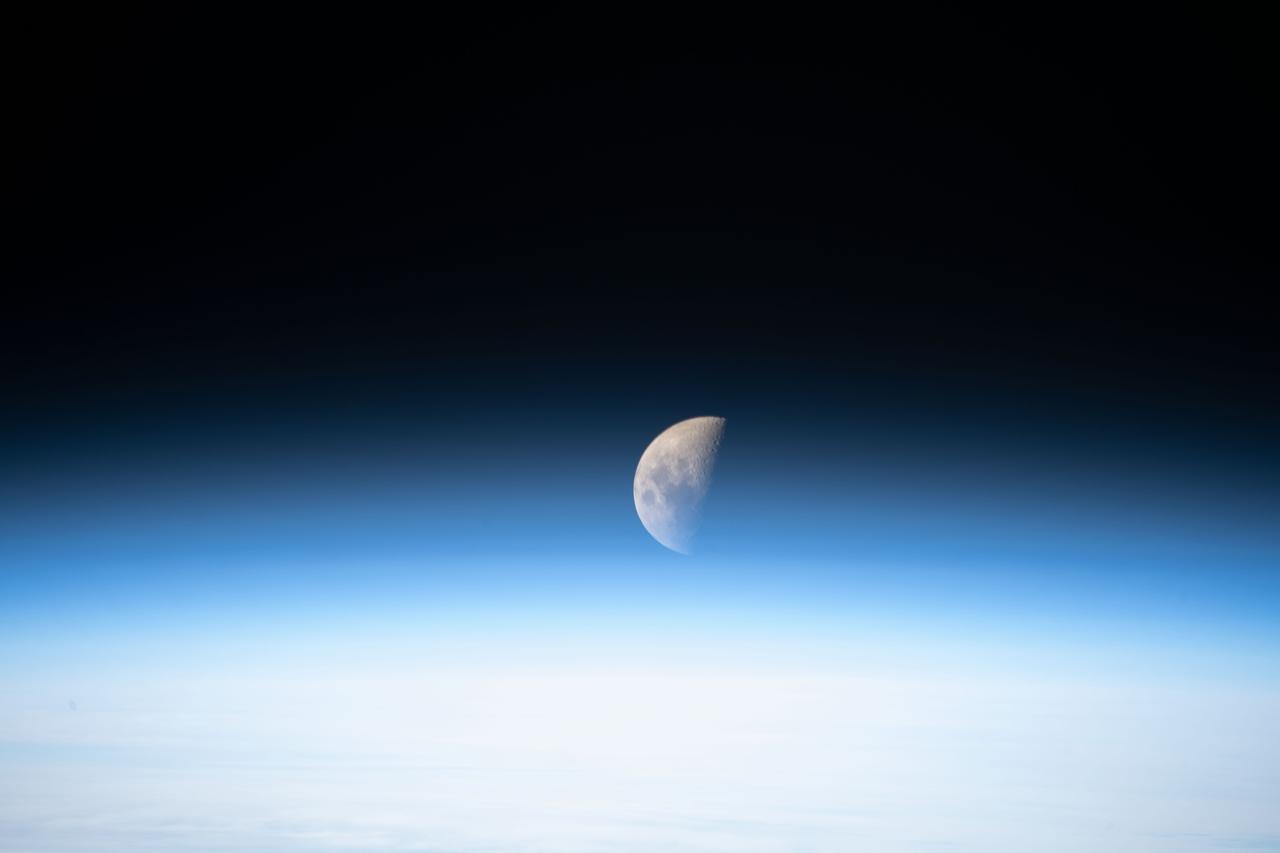 iss061e003881 (Oct. 5, 2019) --- A first quarter Moon is pictured from the International Space Station just above the Earth's limb.