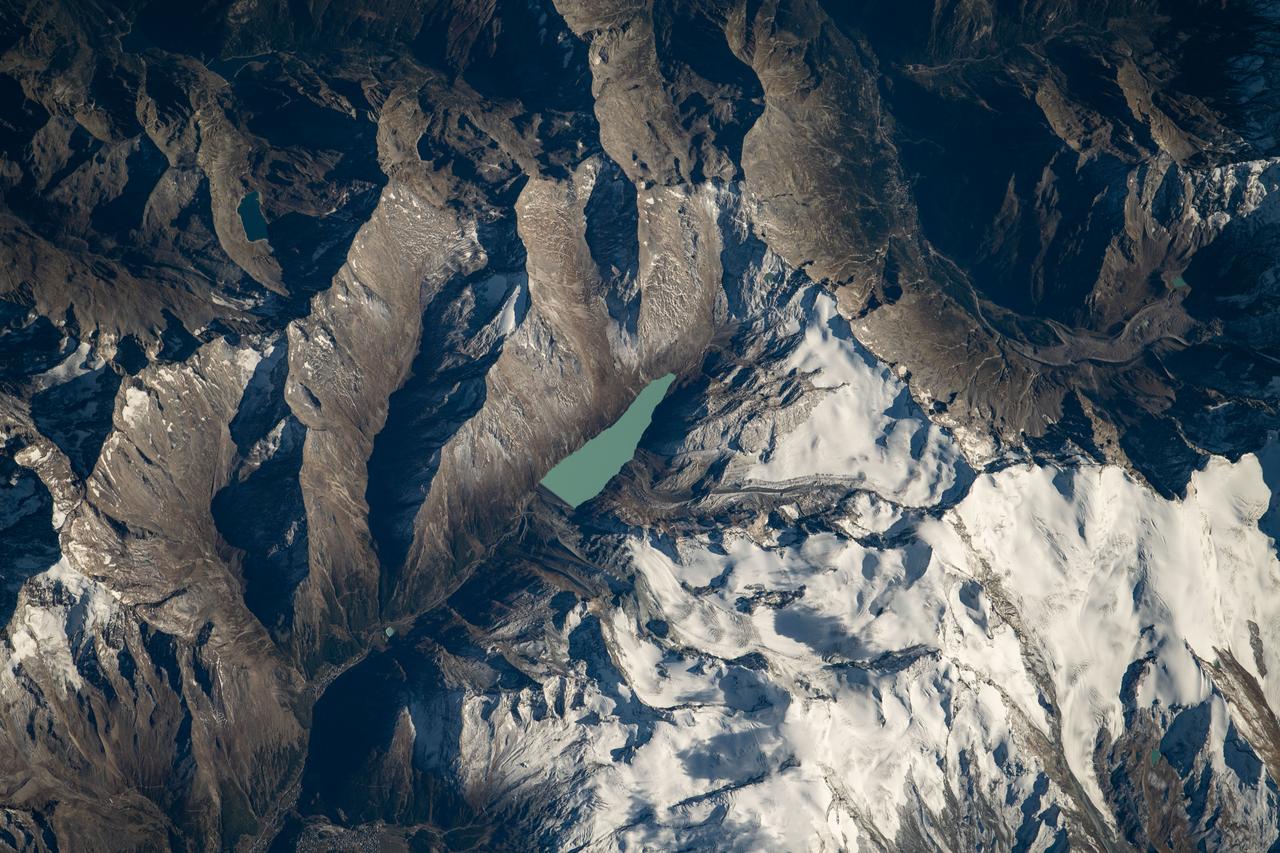 iss061e004462 (Oct. 8, 2019) --- The Mattmarksee, a reservoir built in the early 1960's between the Rimpfischhorn and Stellihorn mountains in the Swiss Alps, was photographed from the International Space Station at an altitude of 253 miles above Switzerland.