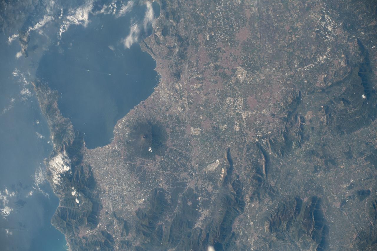 iss061e006435 (Oct. 15, 2019) --- Mount Vesuvius rests in between the Italian cities of Naples and Pompei on the southwest coast of Italy with three million people living in the region. The International Space Station was orbiting 255 miles above the Tyrrhenian Sea between Italy and its island of Sardegna when an Expedition 61 crewmember took this photograph.