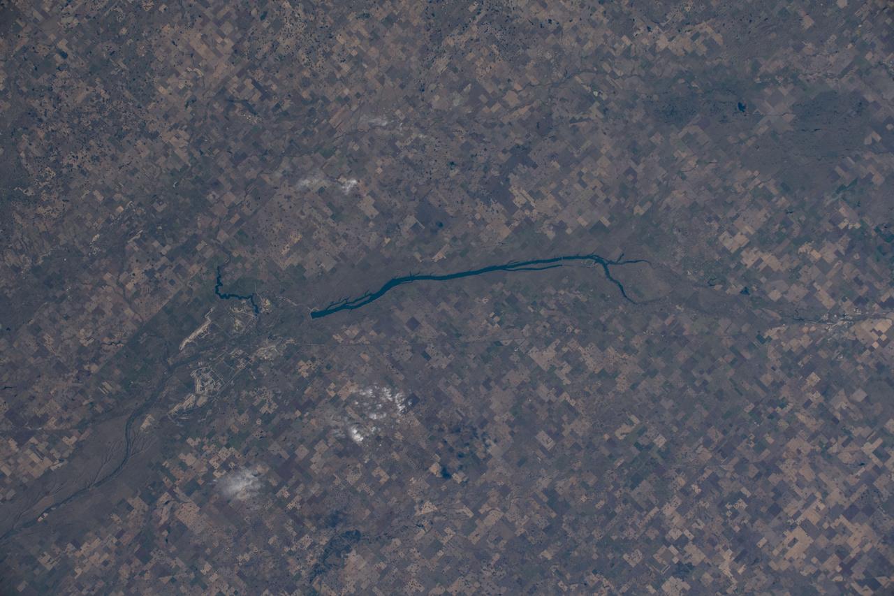 iss061e006776 (Oct. 16, 2019) --- McDonald Lake in Saskatchewan, Canada, is pictured as the International Space Station orbited 254 miles above North America. The coal-mining city of Estevan, at the lake's southeast end surrounded by prairies and farms, is 10 miles north of the United States border of North Dakota.