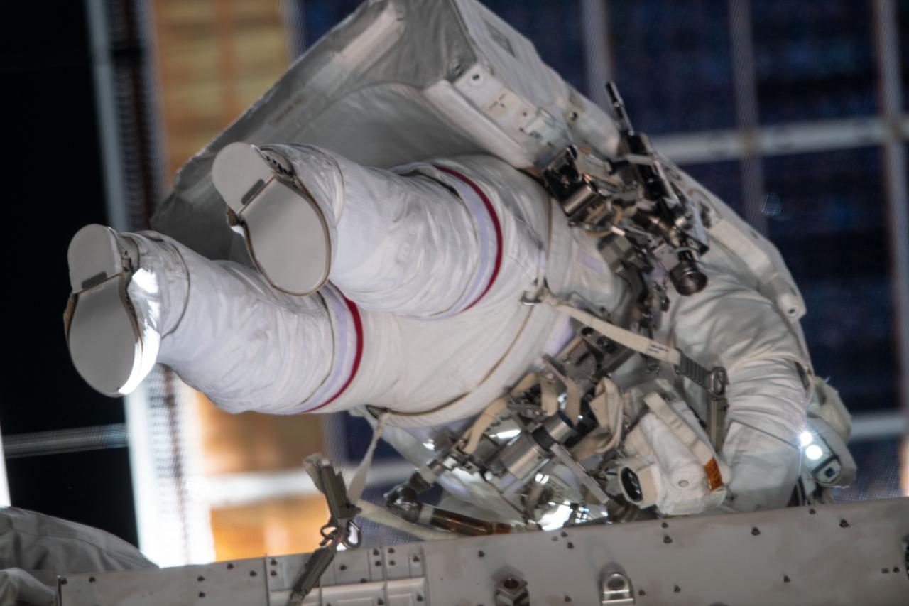 iss061e008880 (Oct. 18, 2019) --- NASA astronaut Christina Koch conducts her fourth spacewalk at the International Space Station. She and fellow NASA astronaut Jessica Meir (out of frame) ventured into the vacuum of space for seven hours and 17 minutes to swap a failed battery charge-discharge unit (BCDU) with a spare during the first all-woman spacewalk. The BCDU regulates the charge to the batteries that collect and distribute solar power to the orbiting lab’s systems.