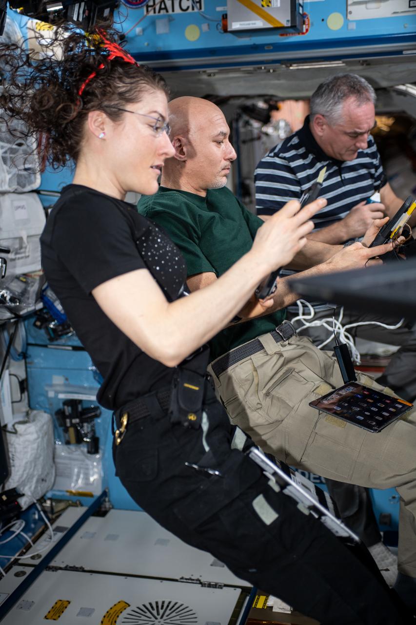 iss061e026185 (Oct. 31, 2019) --- NASA astronaut Christina Koch, Commander Luca Parmitano of ESA (European Space Agency) and Roscosmos cosmonaut Alexander Skvortsov brush up on their emergency response skills in the unlikely event they would need to evacuate the station in their Soyuz crew ship. The trio practiced quickly entering their Soyuz crew ship and simulated emergency undocking and descent procedures.