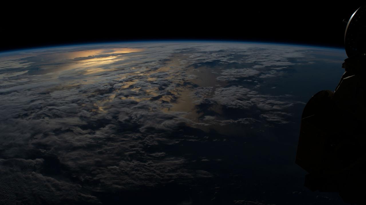 iss061e036737 (Nov. 9, 2019) --- The International Space Station orbits 264 miles above Argentina on its northeast track across South America as this photograph looks across the Atlantic Ocean during an orbital sunset.