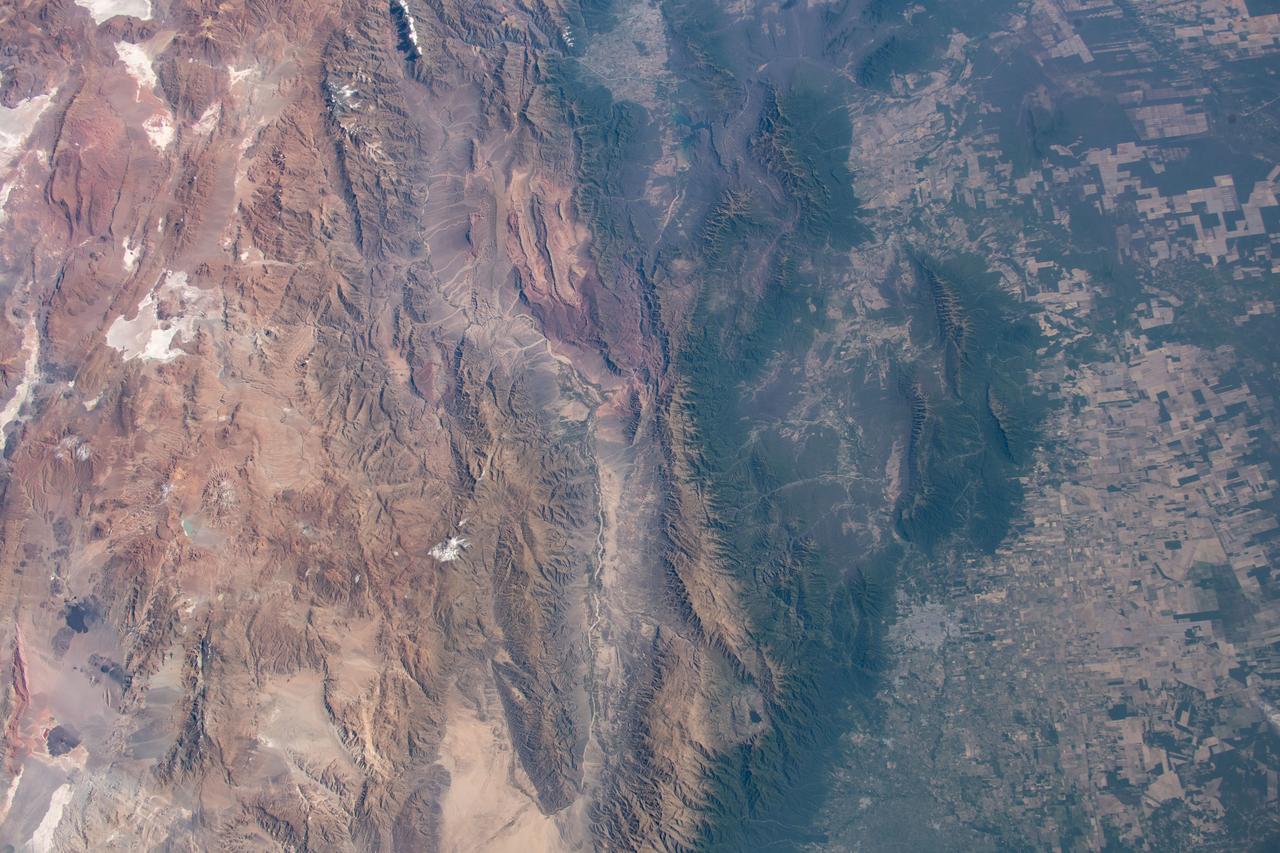 iss061e048086 (Nov. 19, 2019) --- The Andes mountain range that separates the arid and sub-tropical climates in northern Argentina is pictured as the International Space Station orbits from an altitude of 260 miles.