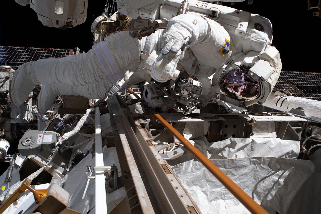 iss061e058236 (Nov. 22, 2019) --- Astronaut Andrew Morgan of NASA is tethered to the Starboard-3 truss segment work site during the second spacewalk to repair the International Space Station's cosmic particle detector, the Alpha Magnetic Spectrometer.