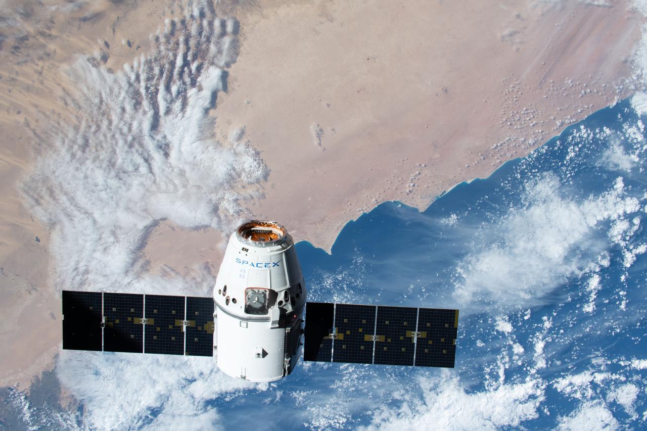 iss061e069080 (Dec. 8, 2019) --- The SpaceX Dragon resupply ship approaches the International Space Station as both spacecraft were orbiting 257 miles above Egypt and about to cross over the Mediterranean Sea.