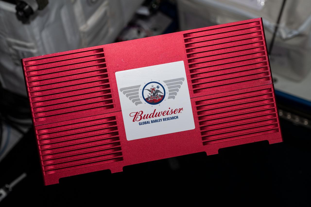 ss061e113408 (1/2/2020) —- A view of the Germination of ABI Voyager Barley Seeds in Microgravity CubeLab aboard the International Space Station (ISS). The Malting ABI Voyager Barley Seeds in Microgravity investigation implements a microscale malting procedure in a spaceflight environment. The payload automates the steeping, germination, and kilning processes associated with malting barley. The barley seeds arrive aboard the International Space Station (ISS) in a dry state to begin the malting process. During the steeping process, the seeds are soaked in water so that the moisture content of the barley increases. During the germination phase, the steeping water is removed and the seeds are surrounded by air. Once the seeds show early signs of germination, the system initiates the kilning process which uses heat to dry the seeds and prepare the resultant malt for stowage until return. The malt is examined upon return and compared to a control on the ground.  