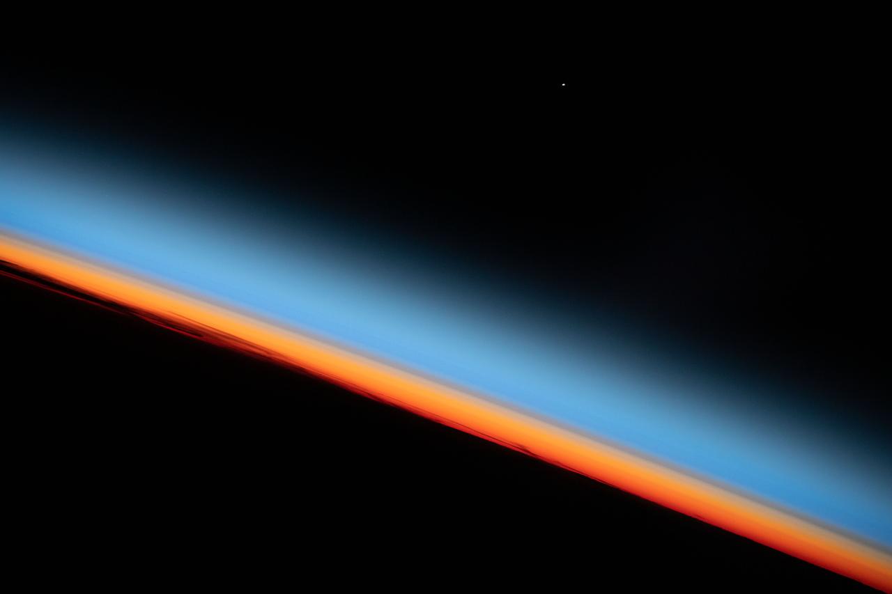 iss061e123468 (Jan. 12, 2020) --- The first rays of an orbital sunrise shine illuminates the Earth's limb and highlights the atmosphere as the International Space Station orbits 259 miles above the central United States.