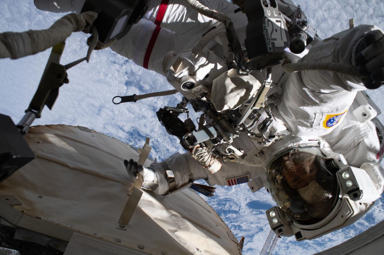 iss061e136770 (Jan. 20, 2020) --- NASA astronaut Jessica Meir is pictured during a spacewalk to finalize upgrading power systems on the International Space Station's Port-6 truss structure. Meir had her photograph taken by fellow NASA astronaut Christina Koch as both spacewalkers were working 266 miles above the Pacific Ocean off the coast of New Zealand.