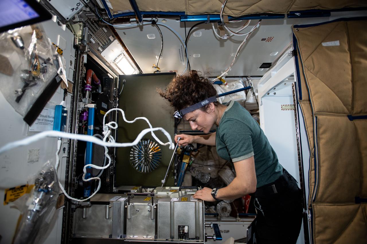 iss062e103552 (March 20, 2020) --- NASA astronaut and Expedition 62 Flight Engineer Jessica Meir works on the Major Constituent Analyzer, a device that measures the orbiting lab’s atmosphere. The life support gear monitors a variety of major constituents, such as nitrogen, carbon dioxide and water vapor to ensure a safe breathing environment for the crew.