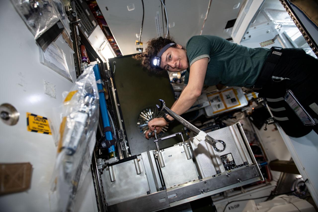 iss062e103558 (March 20, 2020) --- NASA astronaut and Expedition 62 Flight Engineer Jessica Meir works on the Major Constituent Analyzer, a device that measures the orbiting lab’s atmosphere. The life support gear monitors a variety of major constituents, such as nitrogen, carbon dioxide and water vapor to ensure a safe breathing environment for the crew.