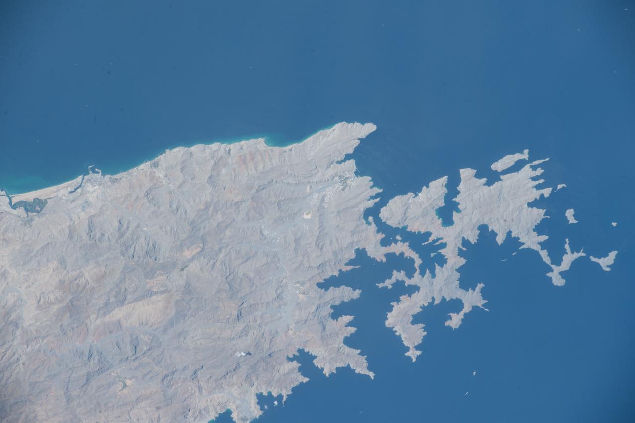 iss063e002679 (April 23, 2020) --- The northern tip of the Middle Eastern nation of Oman is pictured on the Strait of Hormuz. The International Space Station was orbiting above the Persian Gulf when this photograph was taken.