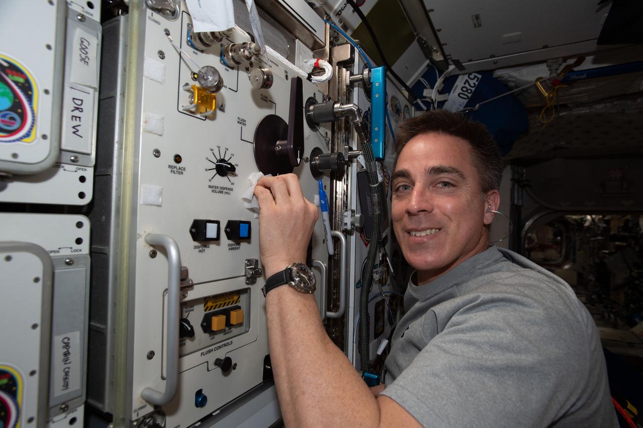 iss063e004846 (May 2, 2020) --- NASA astronaut and Expedition 63 Commander Chris Cassidy performs household chores and cleans life support gear aboard the International Space Station.