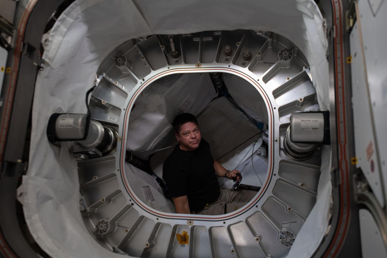 iss063e028476 (July 1, 2020) --- NASA astronaut and Expedition 63 Flight Engineer Bob Behnken is pictured inside the Bigelow Expandable Activity Module (BEAM) during operations to retrieve charcoal filters.