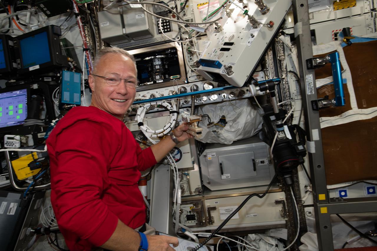 iss063e033724 (June 28, 2020) --- NASA astronaut and Expedition 63 Flight Engineer Doug Hurley works on science hardware inside the International Space Station's U.S. Destiny laboratory. The Multi-use Variable-g Platform is a research facility that can produce up to 2 g of artificial gravity for biological studies of fruit flies, flatworms, plants, fish, cells, protein crystals and many others.