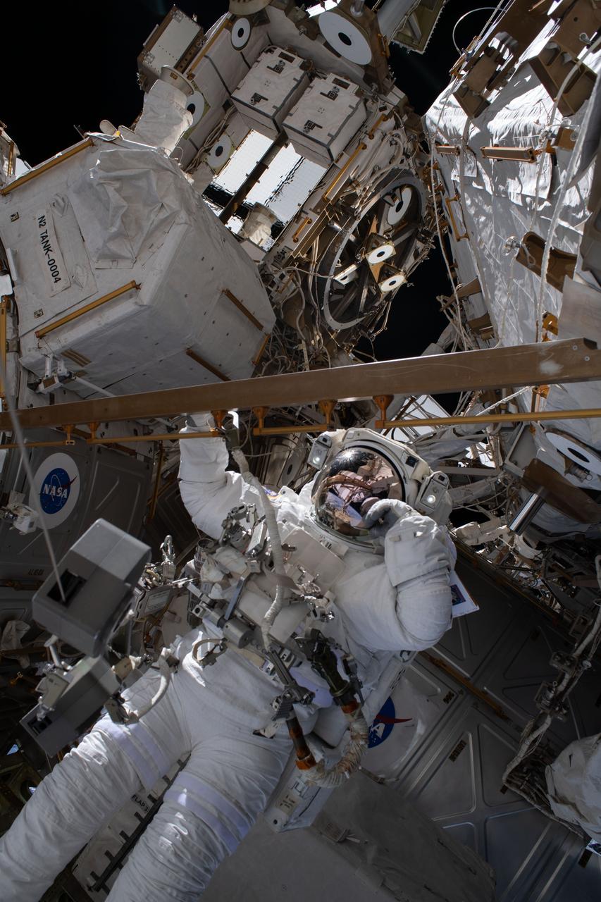 iss063e034203 (July 1, 2020) --- NASA astronaut and Expedition 63 Flight Engineer Bob Behnken works during a six-hour and one-minute spacewalk to swap an aging nickel-hydrogen battery for a new lithium-ion battery on the International Space Station's Starboard-6 truss structure.