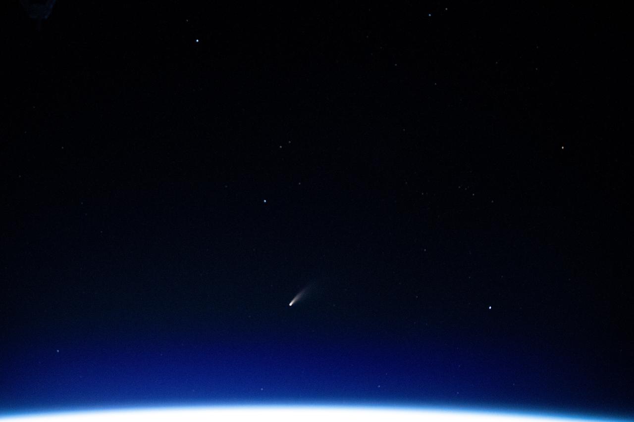 iss063e040067 (July 5, 2020) --- The tiny shooting star in the lower center of this image is Comet Neowise pictured from the International Space Station as it orbited above the Mediterranean Sea in between Tunisia and Italy.