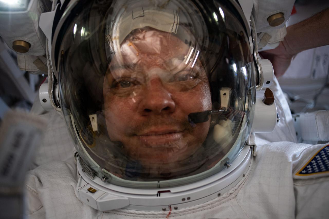 iss063e052704 (July 21, 2020) --- NASA spacewalker Bob Behnken takes a "space-selfie" with his helmet visor up on his U.S. spacesuit.