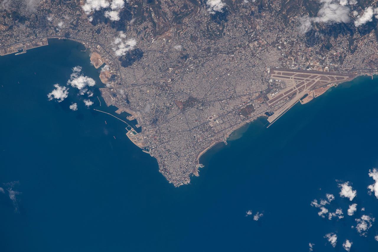 iss063e067994 (Aug. 11, 2020) --- Beirut, Lebanon is pictured from the International Space Station as it orbited above southeastern Syria. At right, is the Beirut-Rafic Hariri International Airport.