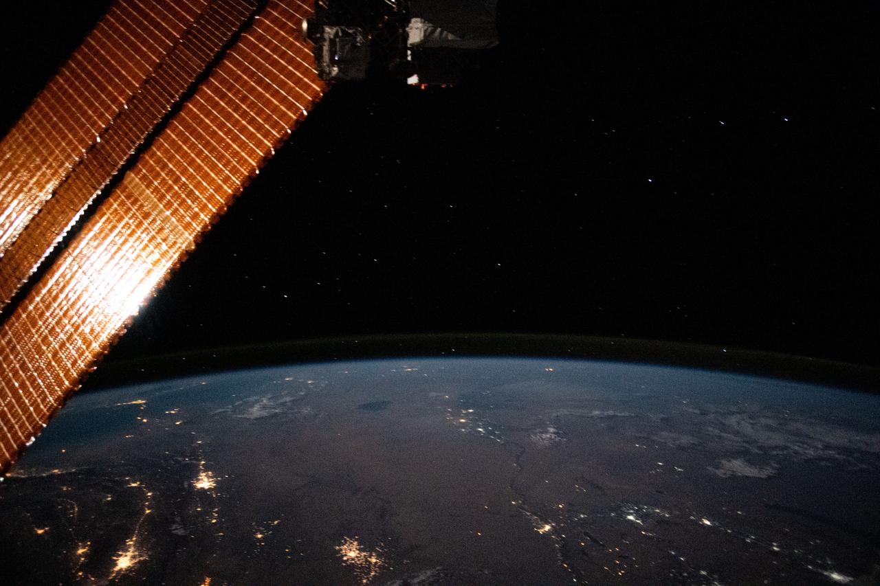 iss063e081388 (Aug. 31, 2020) --- This nighttime photograph from the International Space Station looks north across Turkmenistan and Uzbekistan with the Caspian Sea at left towards the Earth's horizon. At bottom left, is the populated oasis area of Turkmenistan near the border with Iran.