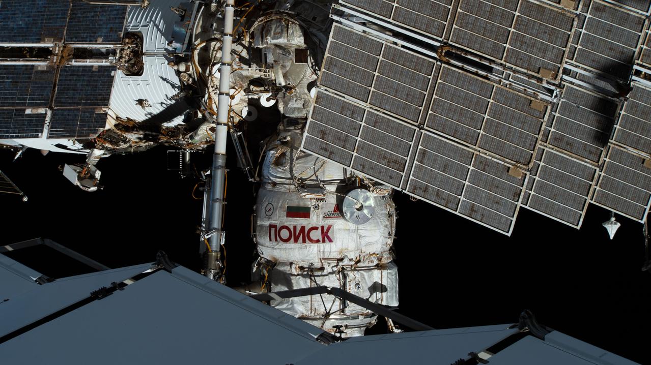 iss063e082811 (Sept. 3, 2020) --- Russia's Mini-Research Module 2, also know as the Poisk module, is pictured from an external high definition camera installed on the International Space Station. Poisk was attached to the space-facing port of the Zvezda service module in November of 2009 and has served as a docking port for Soyuz crew ships. It also provides a place to prepare for spacewalks, as well the refurbishing of the Russian Orlan spacesuits. The module from Roscosmos has the added bonus of extra space for scientific experiments, as well as power supply outlets. It is also equipped with both internal and external workstations to accommodate science payloads and make observations.
