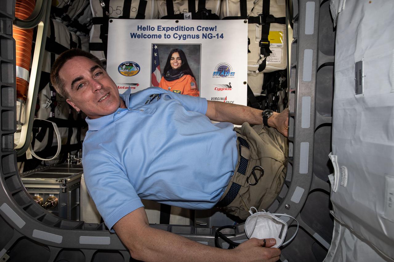 iss063e103888 (Oct. 5, 2020) --- NASA astronaut and Expedition 63 Commander Chris Cassidy is pictured inside the Northrop Grumman Cygnus space freighter named the S.S. Kalpana Chawla after the first female astronaut of Indian descent who also perished on the ill-fated STS-107 mission aboard Space Shuttle Columbia.