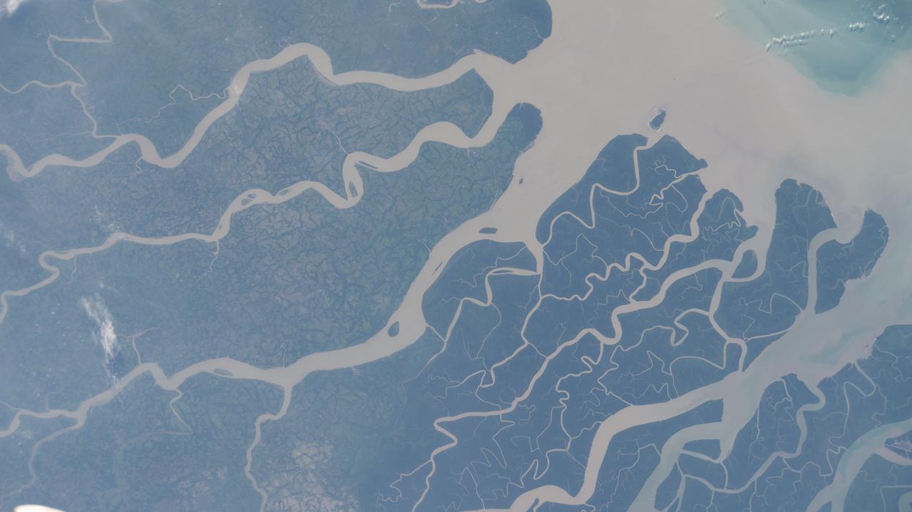 iss063e107090 (Oct. 12, 2020) --- The International Space Station was orbiting above the southern coast of Bangladesh, near the vast mangrove forest and wildlife habitat of India's Sundarban National Park, when this photograph was taken.