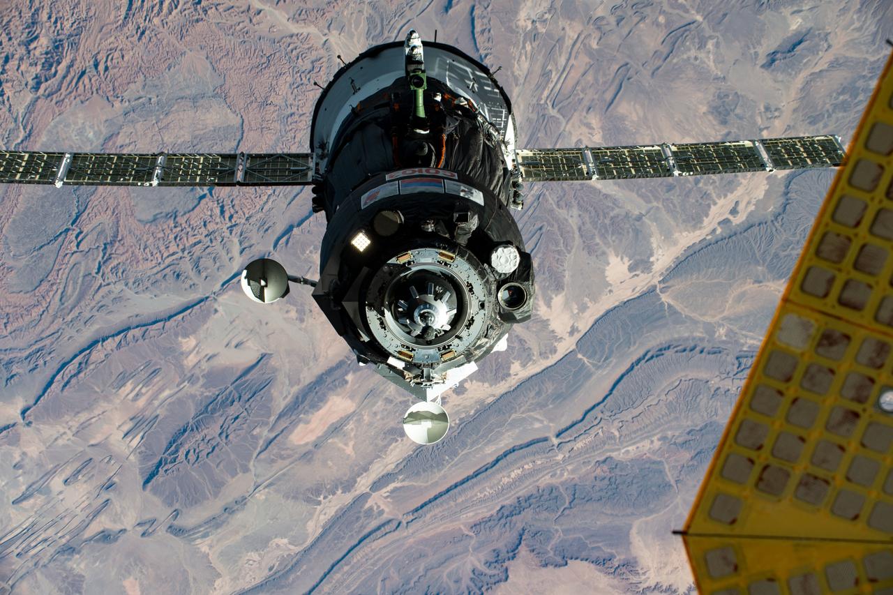 iss063e107241 (Oct. 14, 2020) --- The Soyuz MS-17 spacecraft, with Expedition 64 crew members Kate Rubins of NASA and Roscosmos cosmonauts Sergey Ryzhikov and Sergey Kud-Sverchkov, approaches the International Space Station for a docking to the Rassvet module. This photograph was taken as both spacecraft were orbiting above Morocco.