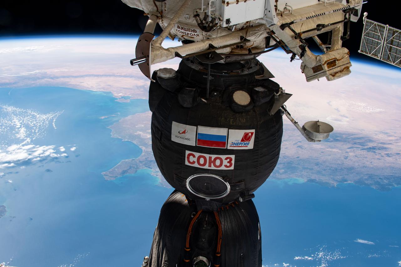 iss063e107419 (Oct. 14, 2020) --- The Soyuz MS-17 spacecraft, with Expedition 64 crew members Kate Rubins of NASA and Roscosmos cosmonauts Sergey Ryzhikov and Sergey Kud-Sverchkov, docked to the Rassvet module as the International Space Station was orbiting above the Mediterranean Sea.