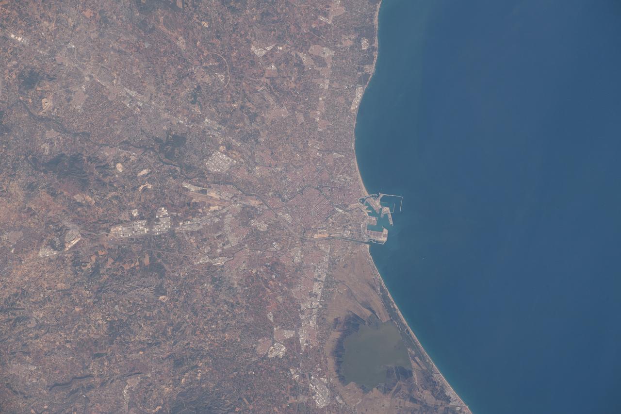 iss064e000399 (Oct. 25, 2020) --- Valencia, Spain is pictured from the International Space Station moments before the orbital lab crossed over the Mediterranean Sea.