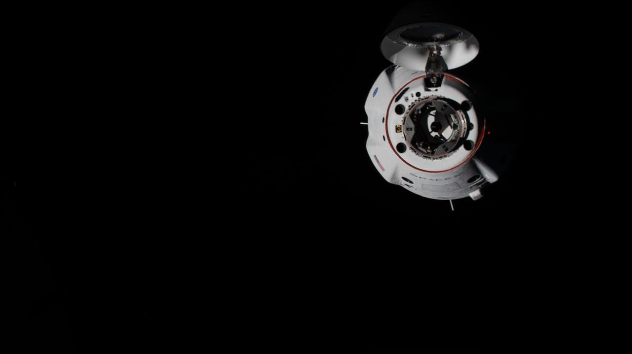 iss064e004637 (Nov. 17, 2020) --- The SpaceX Crew Dragon Resilience is pictured 20 meters away from the International Space Station's international docking adapter on the forward port of the Harmony module.