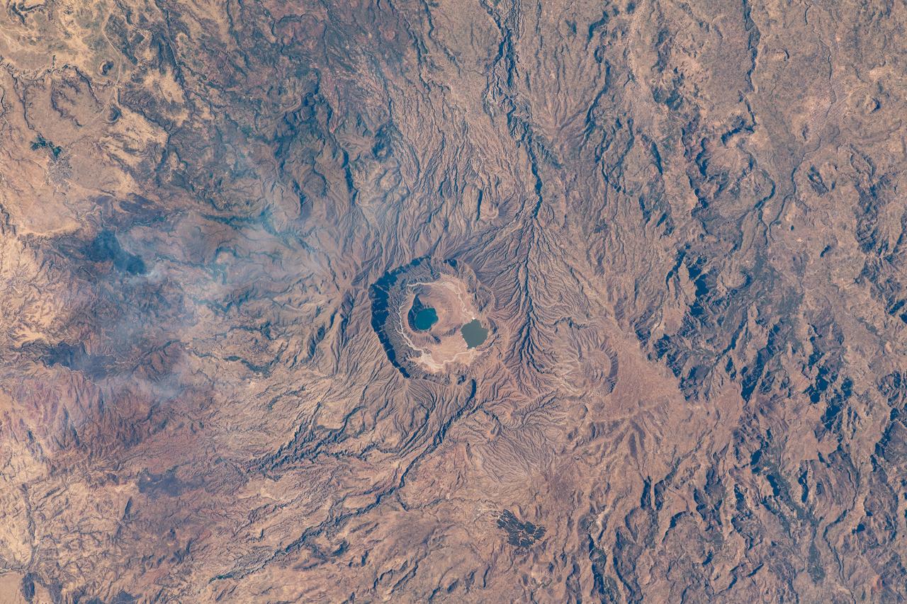 iss064e006219 (Nov. 26, 2020) --- The Deriba caldera in Darfur, Sudan, which holds two lakes, was pictured from the International Space Station as it orbited 260 miles above the Marrah Mountains.