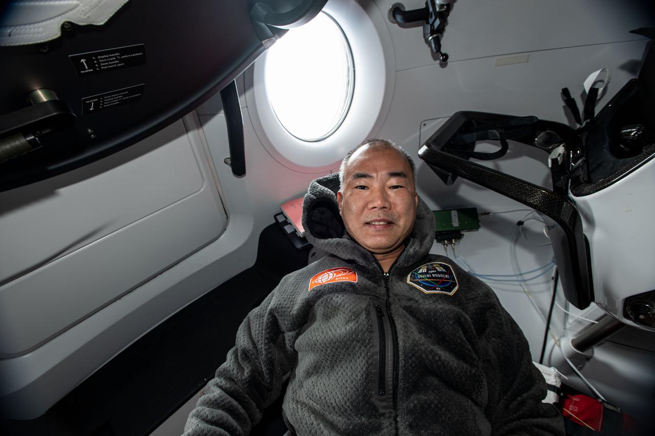 iss064e006442 (Nov. 27, 2020) --- JAXA (Japan Aerospace Exploration Agency) astronaut Soichi Noguchi is pictured next to a window inside "Resilience," the SpaceX Crew Dragon vehicle he and three other astronauts rode to join the Expedition 64 crew aboard the International Space Station.