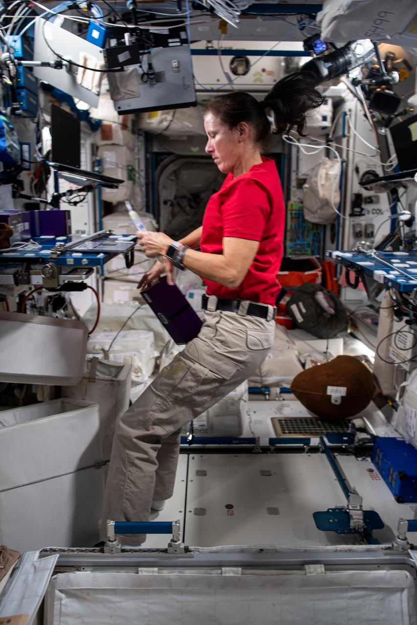 iss064e010970 (12/8/2020) --- NASA astronaut Shannon Walker conducts activation operations (OPS) for a Nanoracks-National Center for Earth and Space Science Education-Apollo-SSEP Mission 14 to ISS (Nanoracks-NCESSE-Apollo) experiment Mixture Tube, part of Nanoracks Module-9. The photo was taken in the Harmony Node 2 module aboard the International Space Station (ISS).