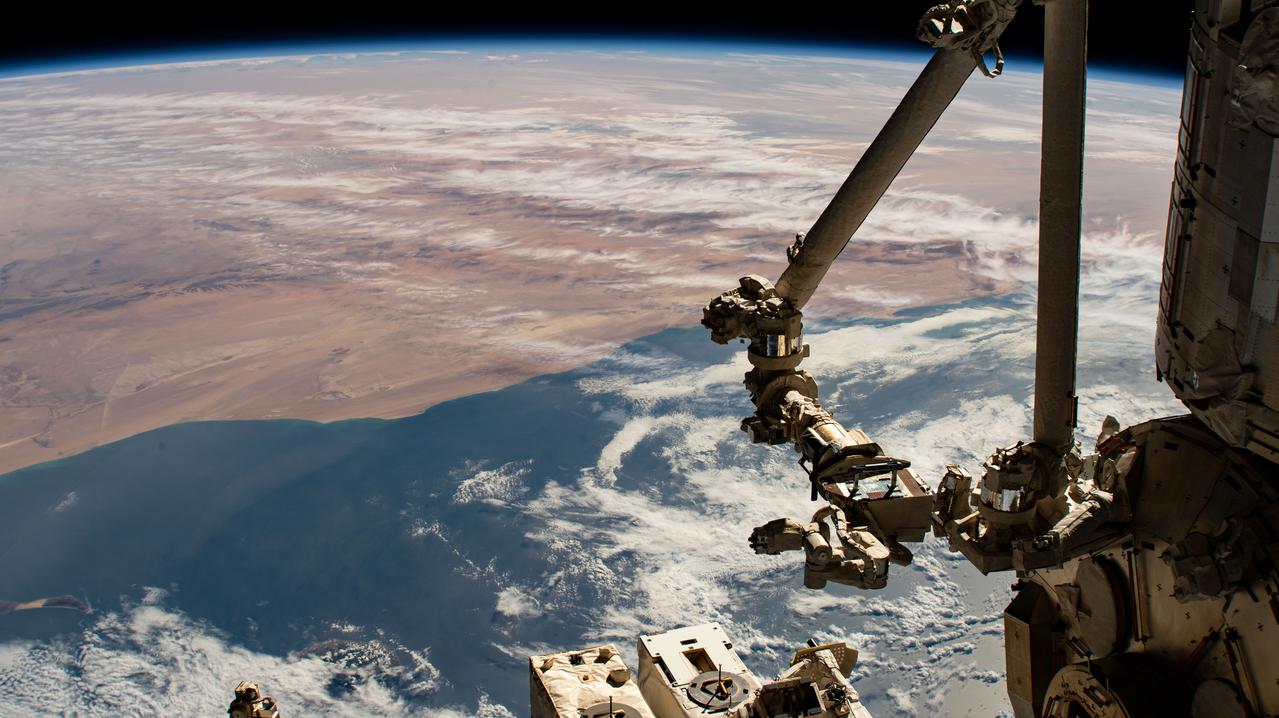 iss064e016368 (Dec. 26, 2020) --- The northwest coast of Africa is pictured from the International Space Station as it orbited 261 miles above the Atlantic Ocean. In the foreground, is the Japanese robotic arm which is part of the Kibo laboratory module from JAXA (Japan Aerospace Exploration Agency).