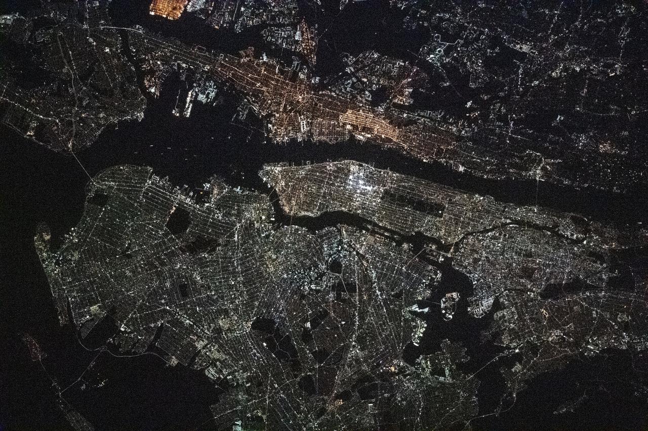 iss064e016772 (Dec. 30, 2020) --- This night time photograph of New York City, and the surrounding New York/New Jersey metropolitan area, was taken from the International Space Station as it orbited 263 miles above Pennsylvania.