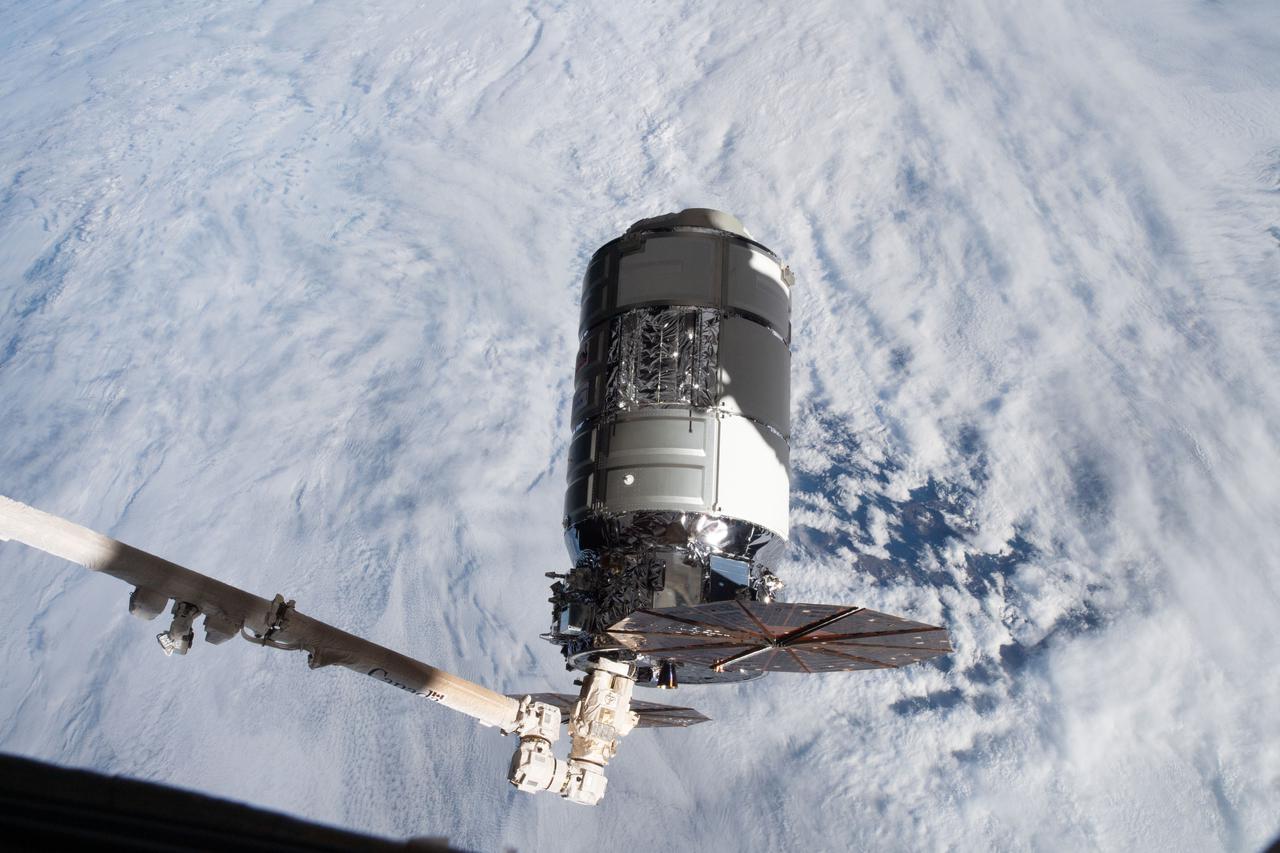 iss064e020730 (Jan. 2021) --- The Northrop Grumman Cygnus space freighter is pictured attached to the Canadarm2 robotic arm after it had been uninstalled from the International Space Station's Unity module. Robotics controllers would command the Canadarm2 a few hours later to release Cygnus after 93 days attached to Unity.