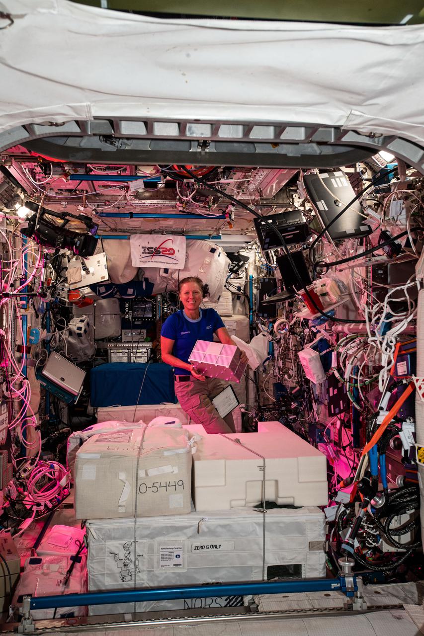iss064e021978 (Jan. 10, 2021) --- Flight Engineer Shannon Walker of NASA is pictured inside Europe's Columbus laboratory module packing research cargo before loading it inside the SpaceX Cargo Dragon resupply ship ahead of its undocking and departure from the International Space Station on Jan. 12.