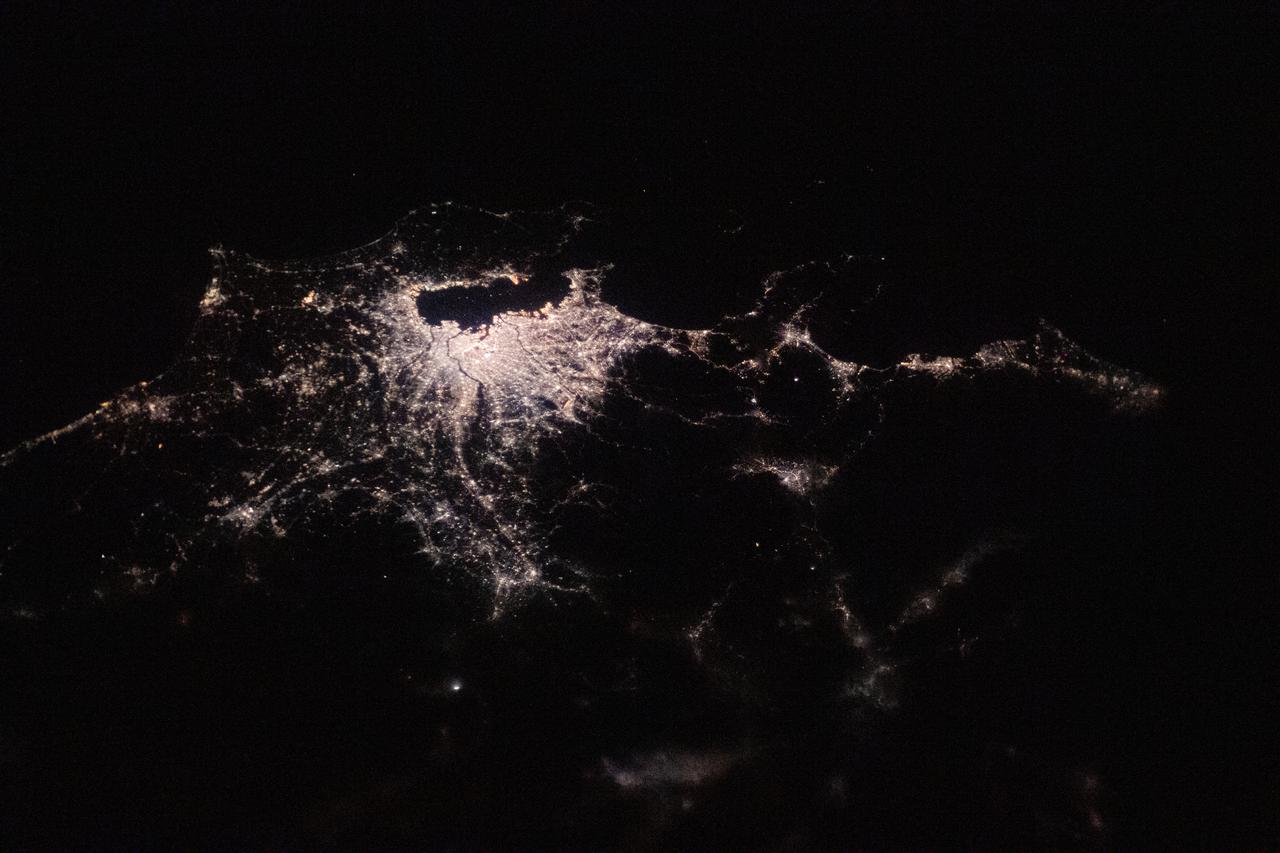 iss064e023814 (Jan. 18, 2021) --- This night time shot of of Tokyo, Yokohama, and the numerous municipalities surrounding Tokyo Bay, was taken from the International Space Station as it orbited 262 miles above the Sea of Japan.